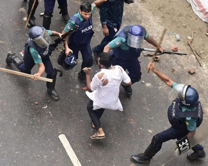 Bangladesh police clash with protesters blockading capital