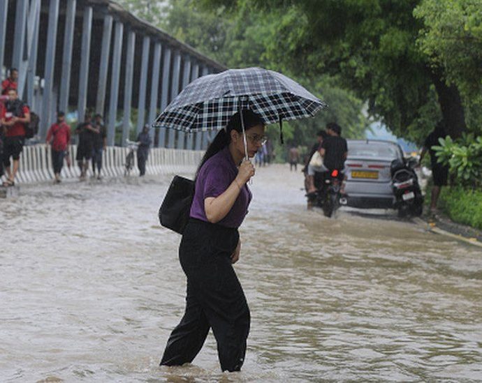 Flood warning in Delhi as rains batter north India