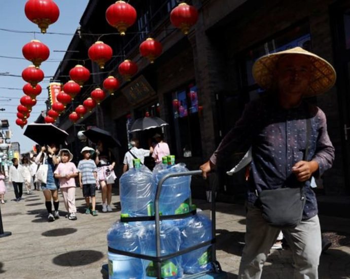 Northern cities in China brace for another day of torrid heat