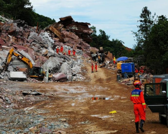 One dead, 7 missing in central China highway landslide