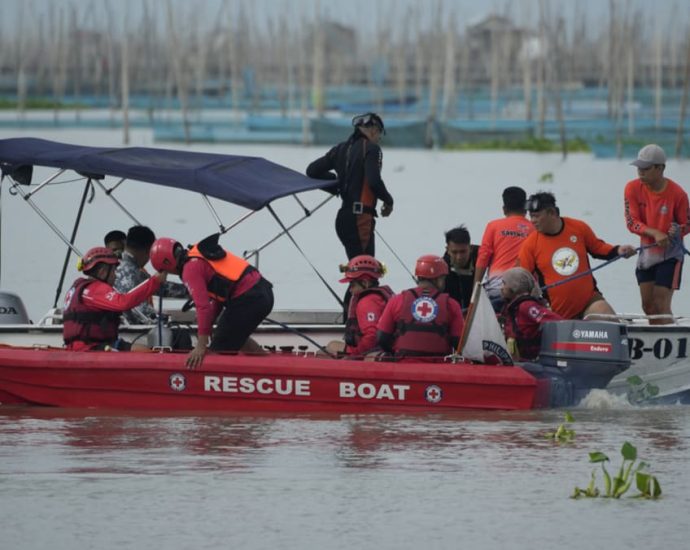 Philippine ferry was overloaded when it flipped over, leaving 26 dead, official says