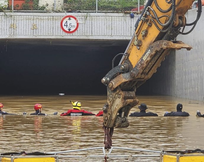 Rescuers recover last body from flooded South Korean tunnel