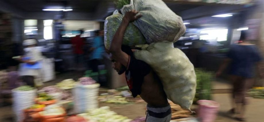 Sri Lanka’s key inflation rate eases sharply to 12% in June