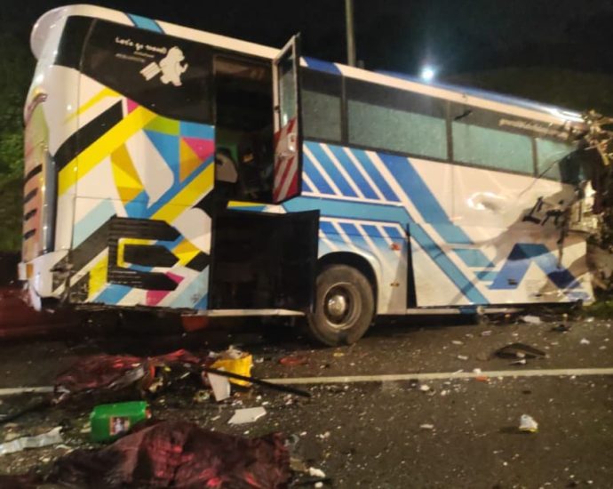 Two dead after tour bus from Singapore collides with car along Malaysia expressway