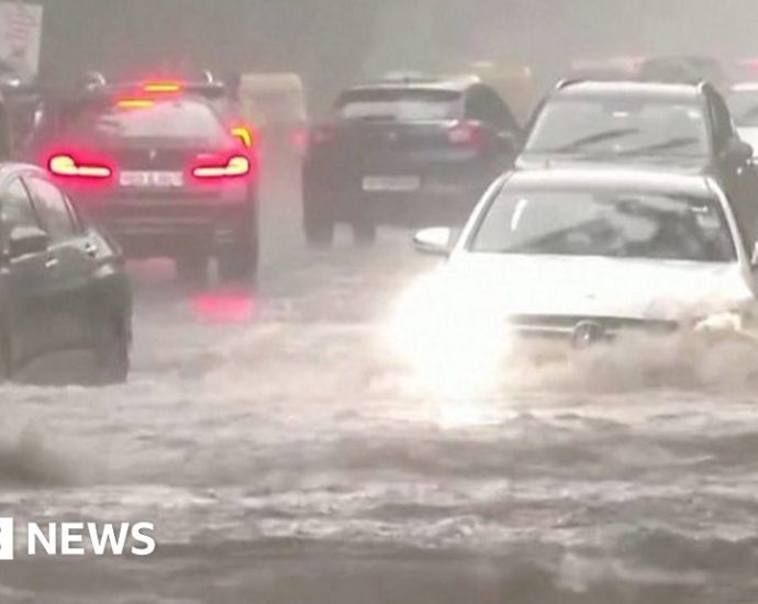 Watch: Cars plough through massive Delhi flooding