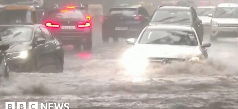 Watch: Cars plough through massive Delhi flooding