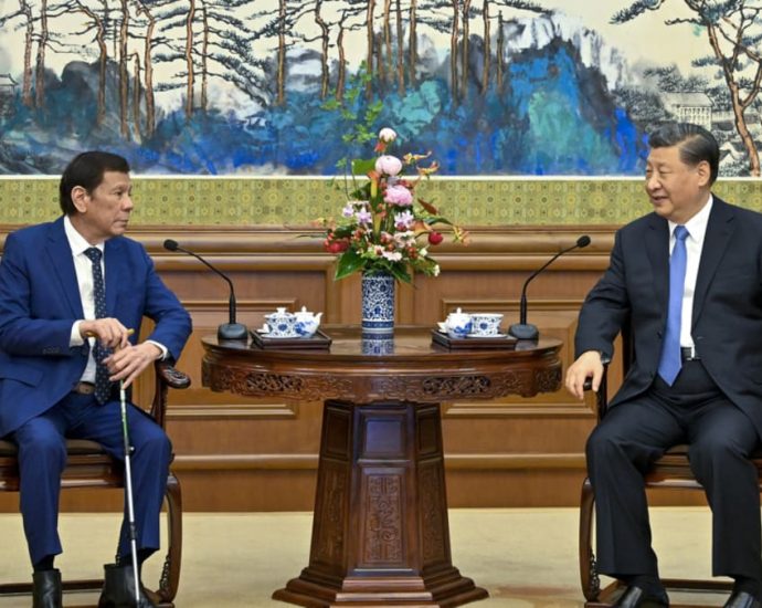 Xi tells ex-Philippine president Duterte to promote ties with China