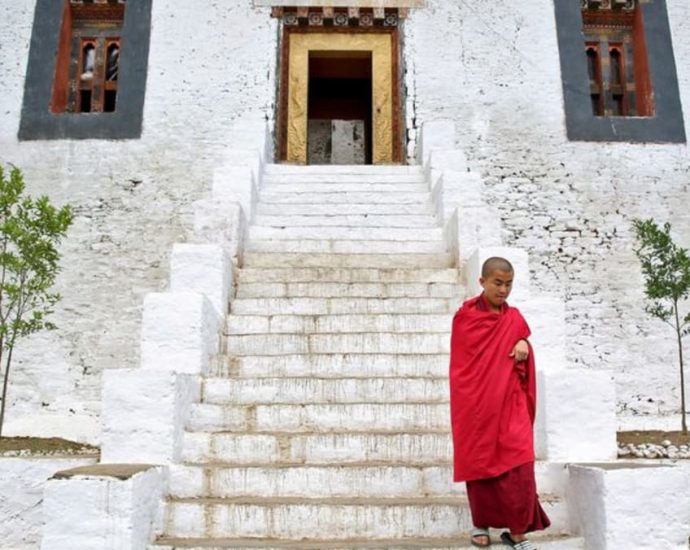 Bhutan cuts daily tourist fee by half to lure more visitors