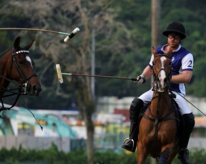 Britain’s Prince Harry saddles up for Singapore charity polo game