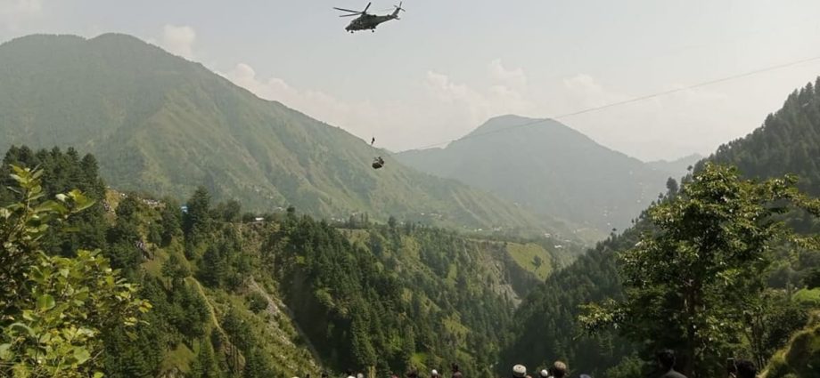 Children trapped in cable car dangling over Pakistan ravine