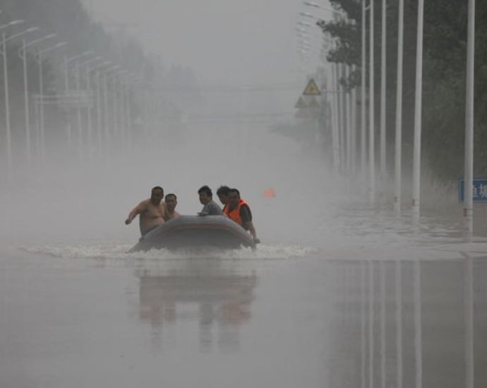 China floodwater diversions to populated areas unleash wave of online anger