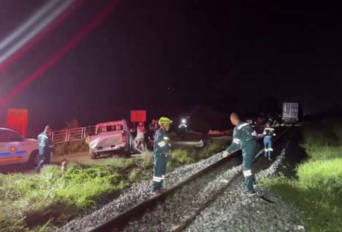 Eight killed, three injured as pick-up hit by train at railway crossing