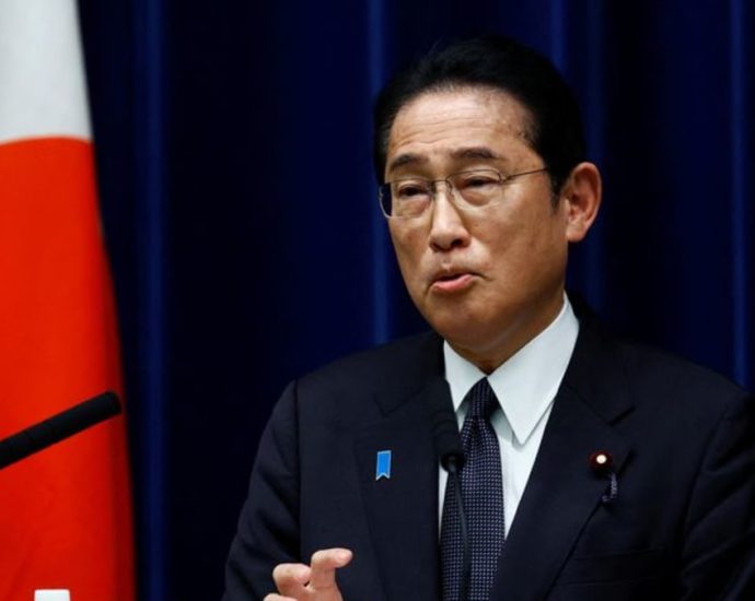 Japan PM Kishida apologises for ID card mishaps as ratings slide