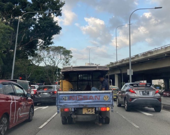 Lorry drivers say ferrying workers in their vehicles is not ideal, but they try to drive safely