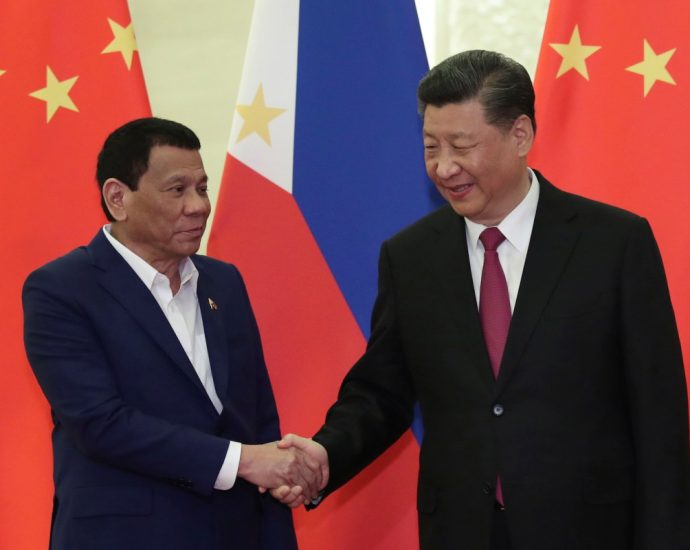 Marcos squeezed between allies