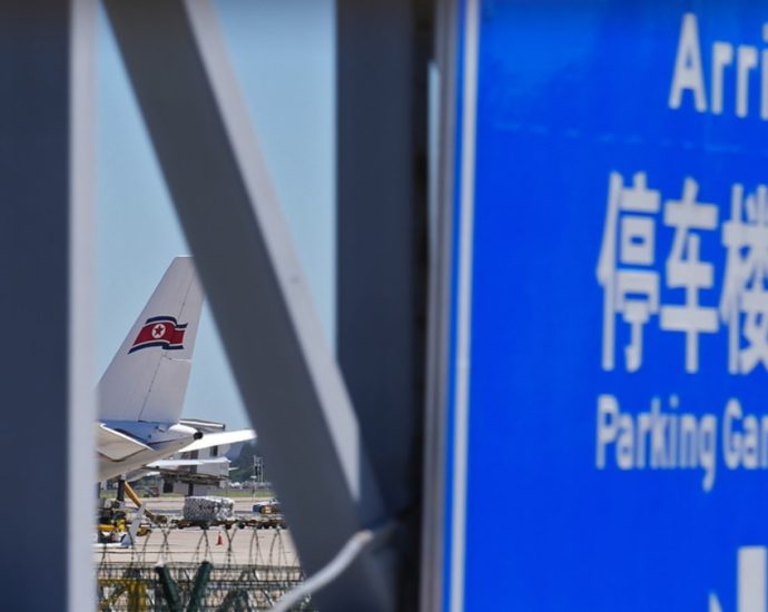 North Korea signals reopening with first passenger flight in three years