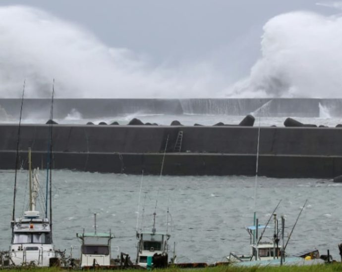 Over 180,000 residents urged to seek shelter as tropical storm soaks Japan