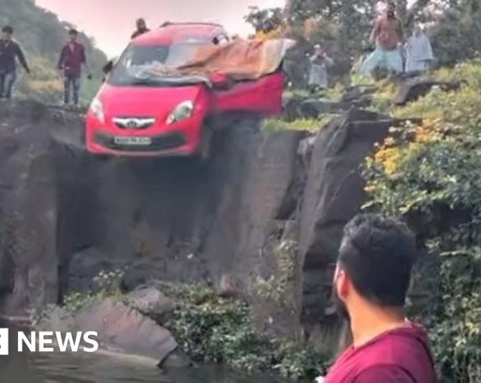 Terrifying moment car falls into India waterfall pool