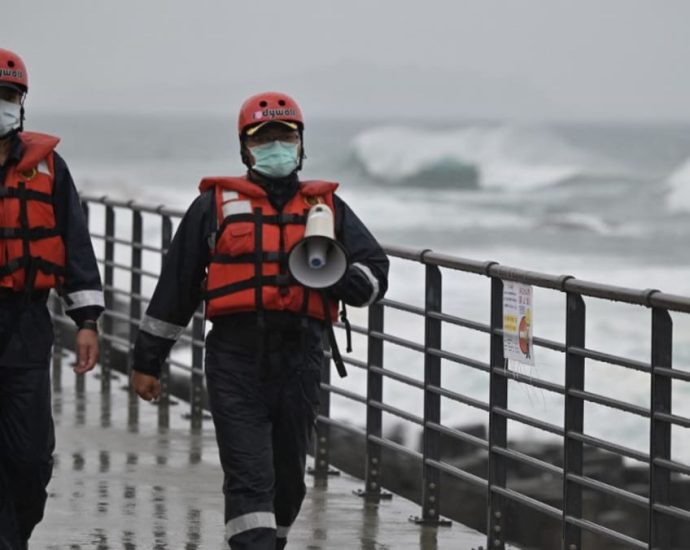 Typhoon Khanun shuts markets, grounds flights in Taiwan