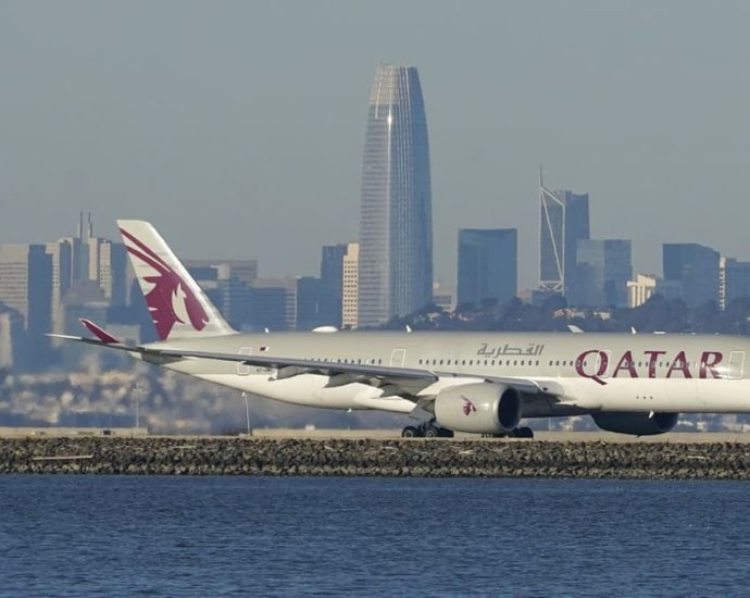 Australian minister says invasive examinations were part of reason Qatar Airways was refused flights