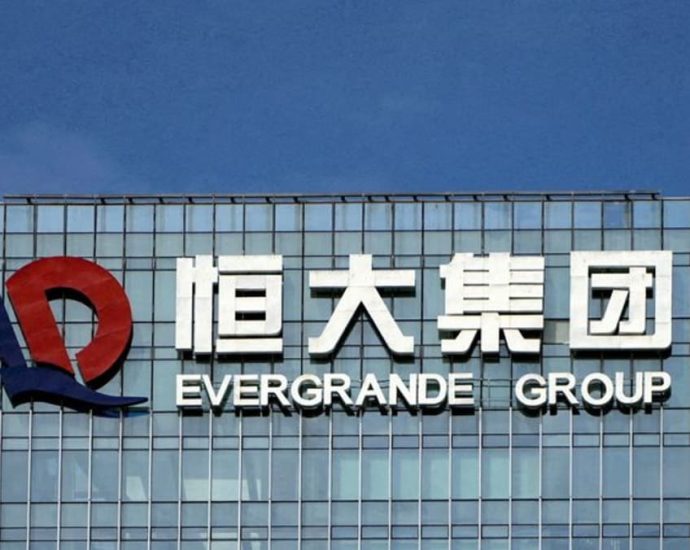 China Evergrande shares tumble for second day after unit misses bond payment