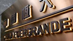 Evergrande: China property giant suspends shares amid reports of detained leaders