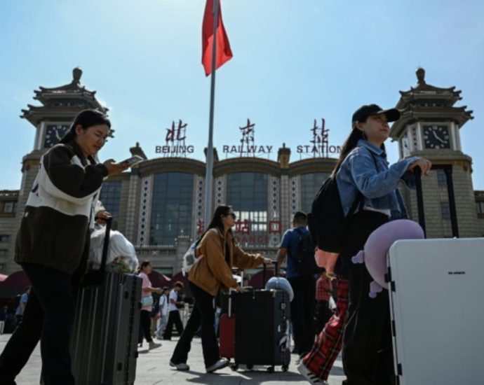 Millions travel across China as national holiday kicks off