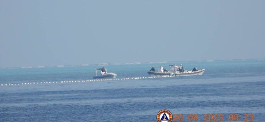 Philippines says no standoff with China after removal of floating barrier in South China Sea