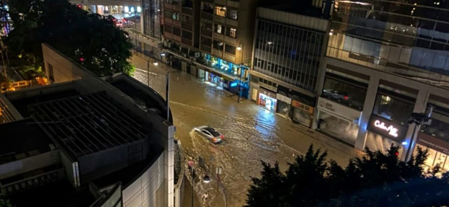 Record rainfall causes flooding in Hong Kong days after typhoon