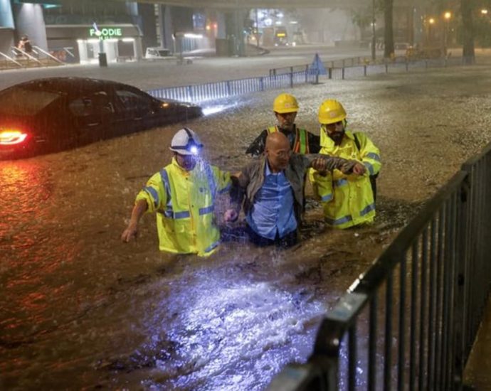 Record rainfall floods Hong Kong’s streets and train stations; all schools shut