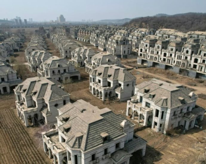 Three cities in China cities lift house buying curbs