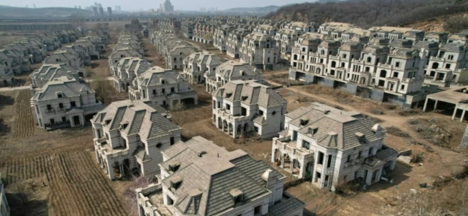 Three cities in China cities lift house buying curbs