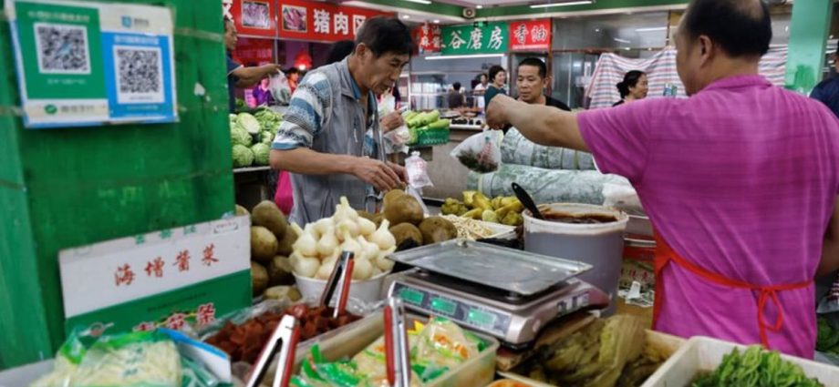 China's consumer prices stall, factory deflation persists