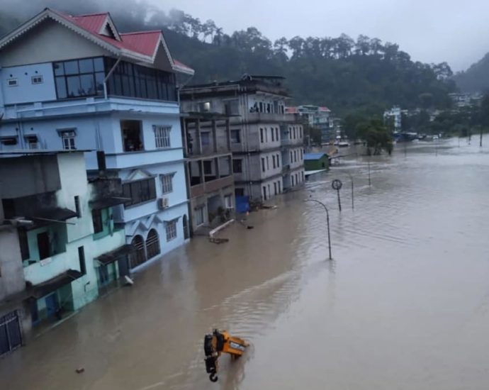 Fourteen dead, 102 missing after Indian glacial lake bursts bank in heavy rain