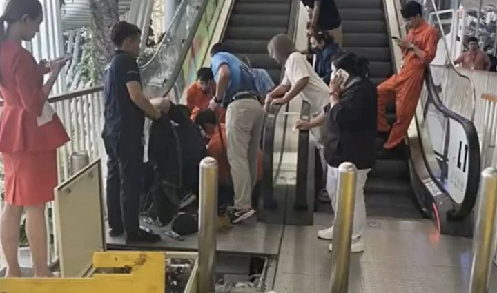 Girl's foot trapped in escalator at mall