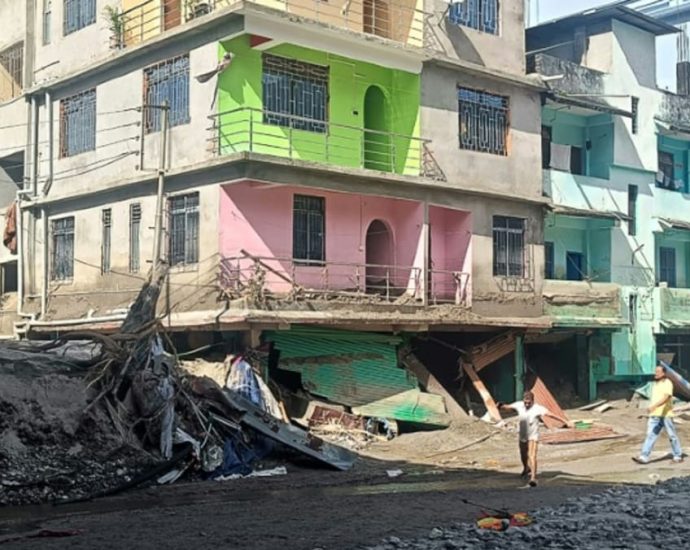 India flood toll hits 56, army warns on stray munitions