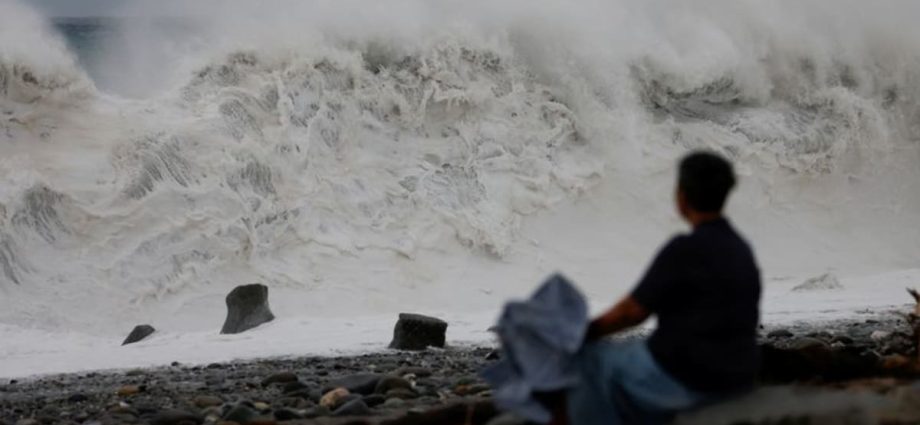 Millions off work as Typhoon Koinu brushes past Taiwan with lashing rain