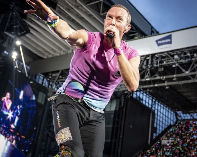 Coldplay wins praise at Tokyo concert after performing song for fan who lost her husband