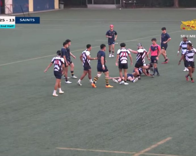 Fight breaks out in Singapore rugby match after player kicks opponent who lay motionless