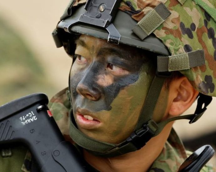 Japanese troops drill on island seen as vulnerable to China