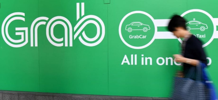 New Grab fee structure incentivising pick-ups of farther passengers 'insufficient', could hurt takings, say some drivers