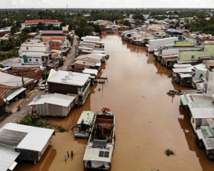 Sand mining in Vietnam’s Mekong Delta sinks homes, livelihoods