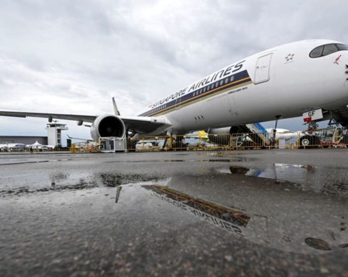 Singapore Airlines posts record half-year profit as air travel demand soars