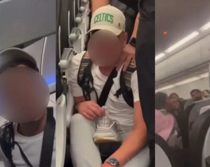 Australian man on Scoot flight to Manila escorted off plane after bloody fight with other passengers