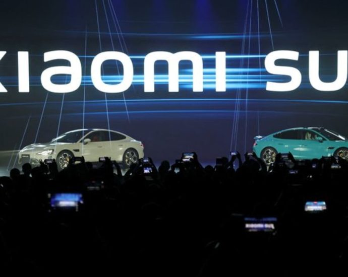 Chinese smartphone giant Xiaomi unveils first electric car
