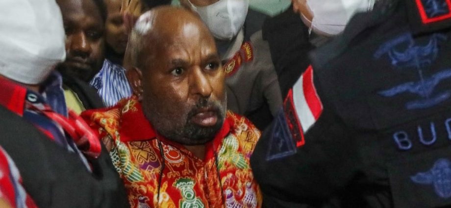 Former Papua governor's death while serving time for corruption sparks criticism against beleaguered anti-graft agency