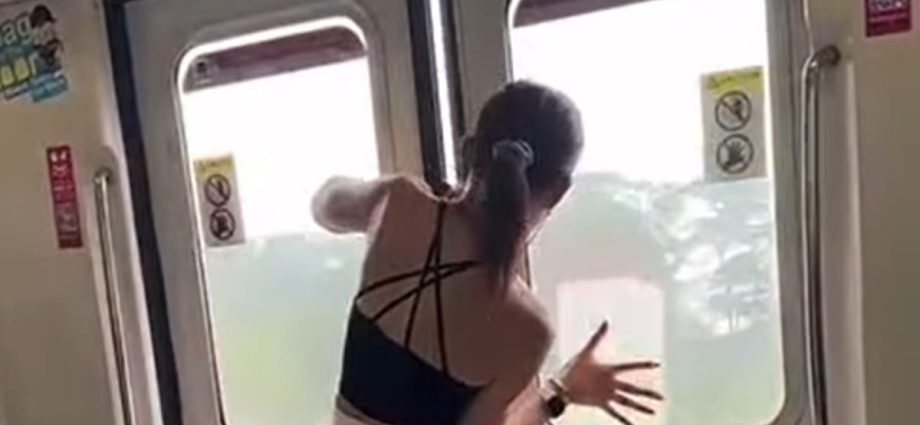Man who tried to pull open MRT doors handed another charge for causing annoyance to commuters