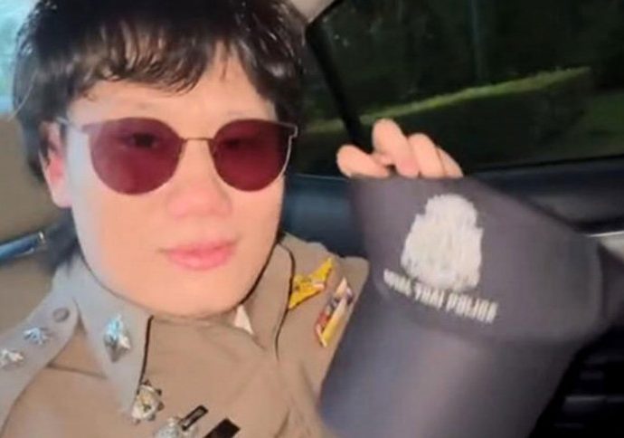 Probe ordered into tourist wearing police uniform in video
