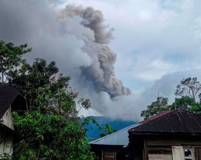 Rescue mission continues as Indonesia volcano erupts, 12 still missing