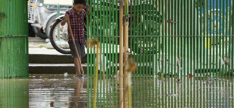 'We have to do something': Philippine schools, students grapple with floods as climate change forces them to adapt